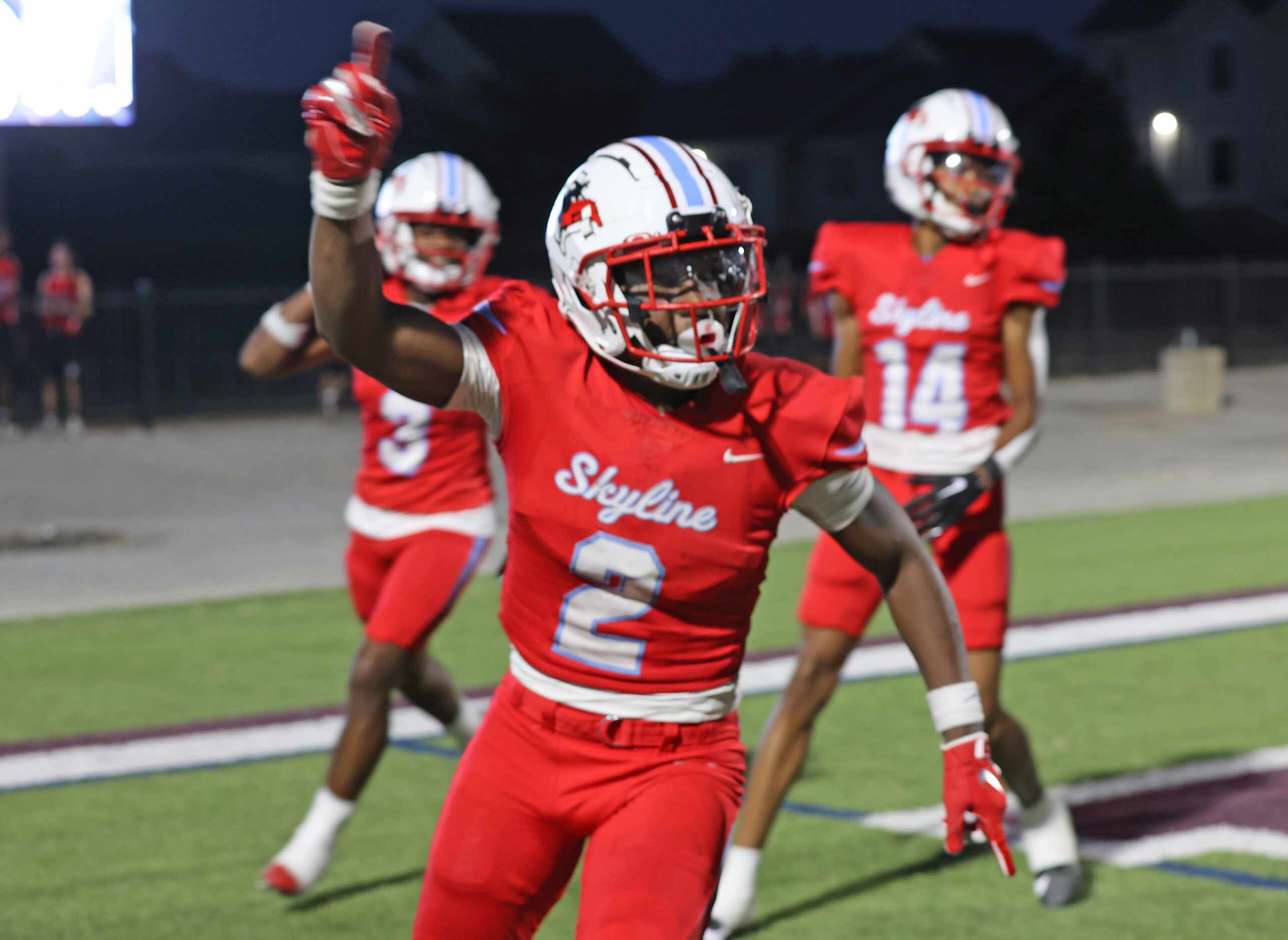Skyline High’s Tramell Minter (2) celebrates his touchdown during the first half of a high...