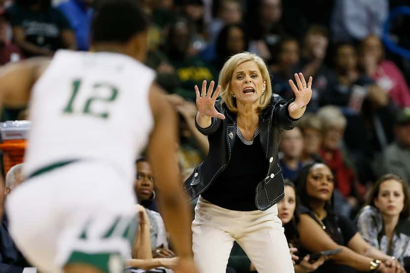 Baylor head coach Kim Mulkey instructs her team against Iowa State during the first half of...