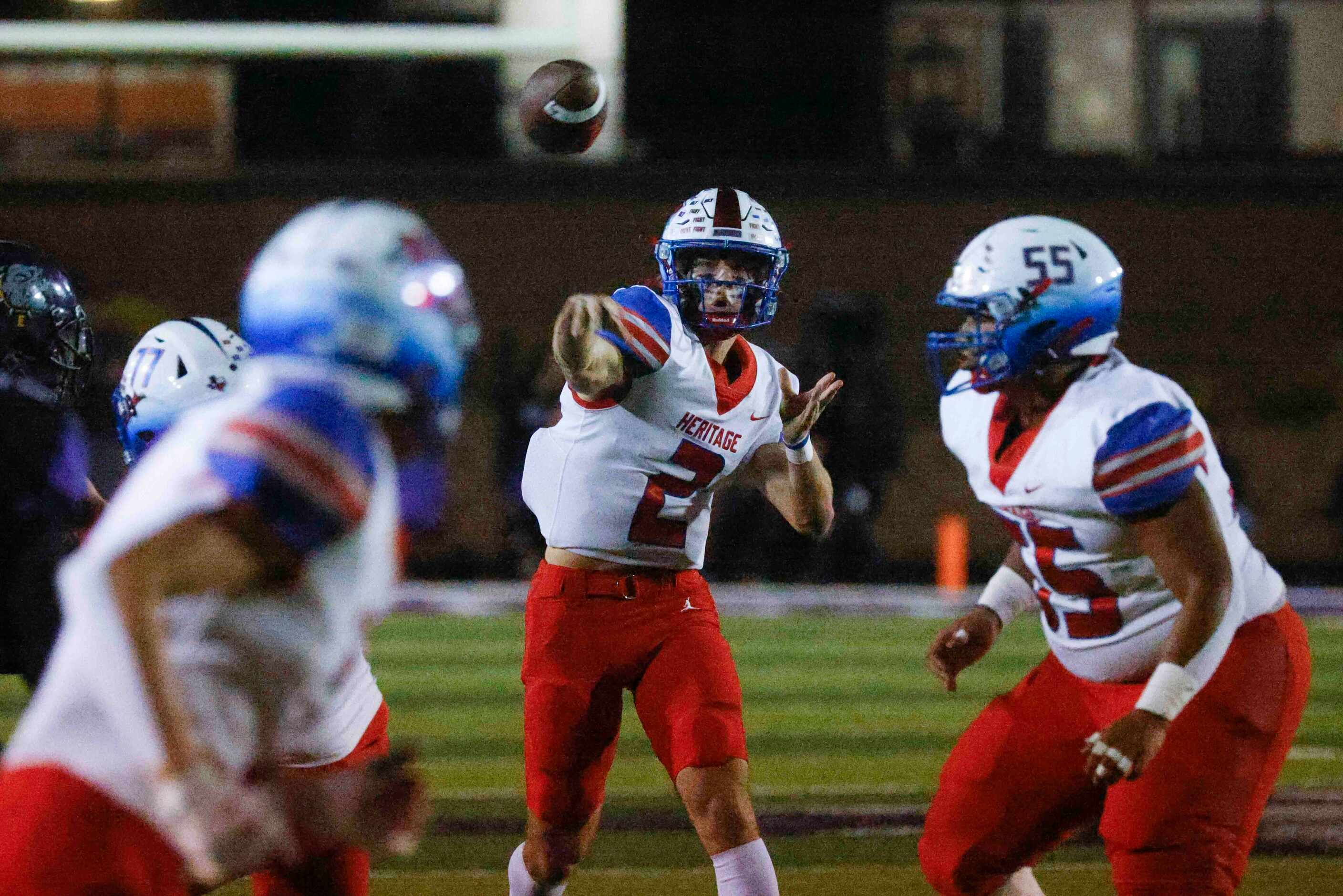 Midlothian Heritage’s QB Kaden Brown throws the ball against Everman High during the first...