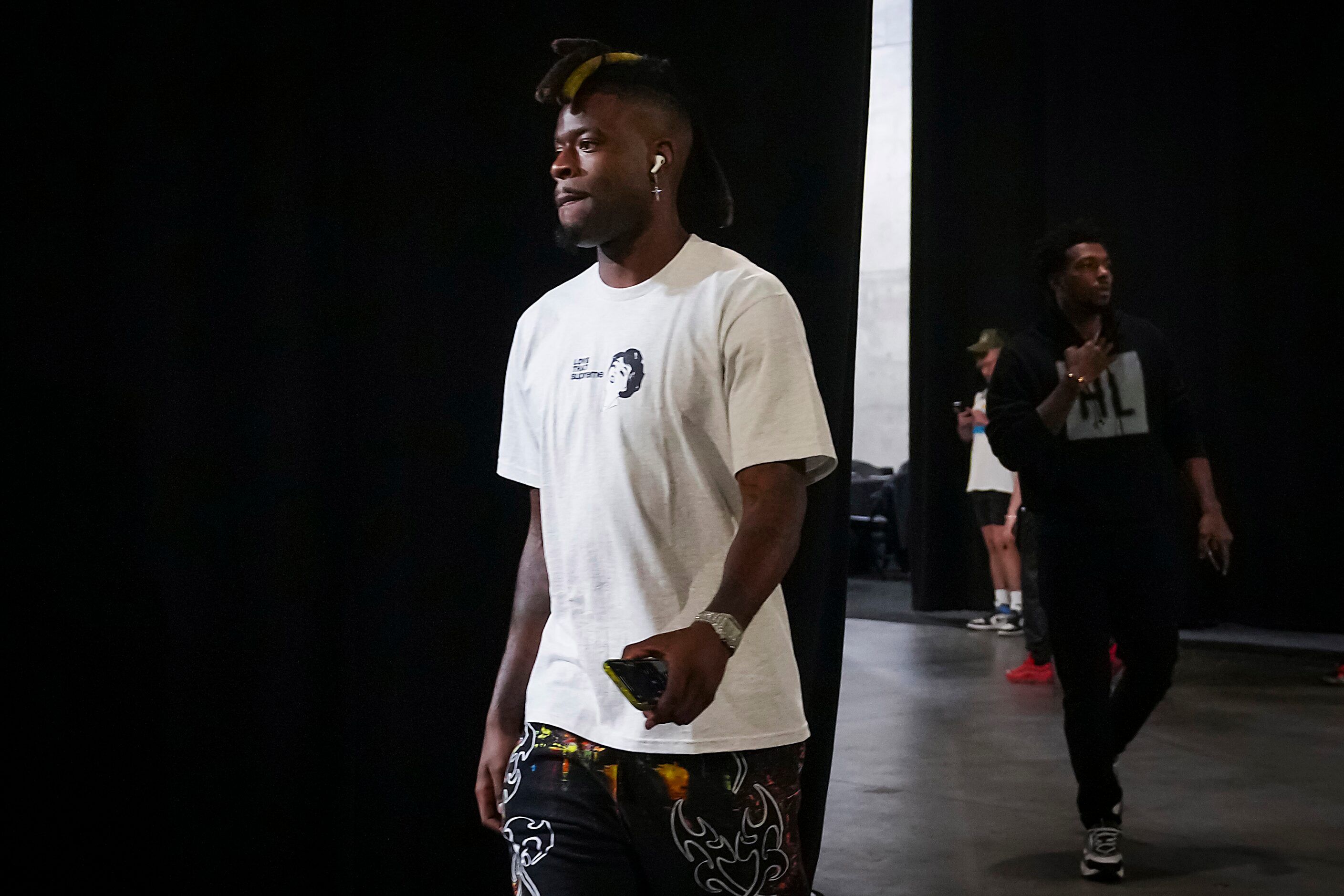 Dallas Mavericks forward Reggie Bullock arrives at the arena before Game 2 of the NBA...