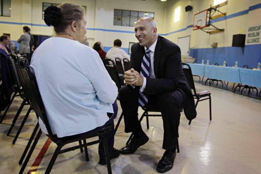 Richardson City Council member Amir Omar met Deborah Deering Schwartz  before a candidate...