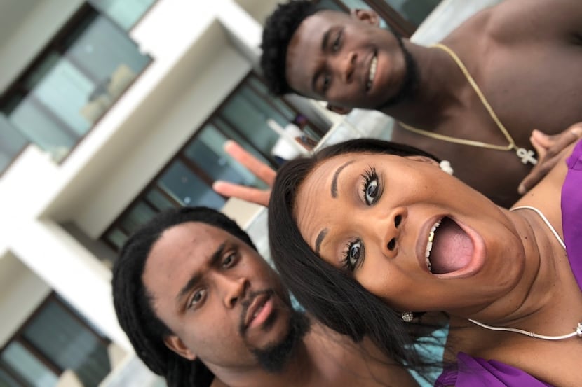 Cowboys wide receiver Allen Hurns (rear) poses for a selfie with his mother Erica Wilson and...