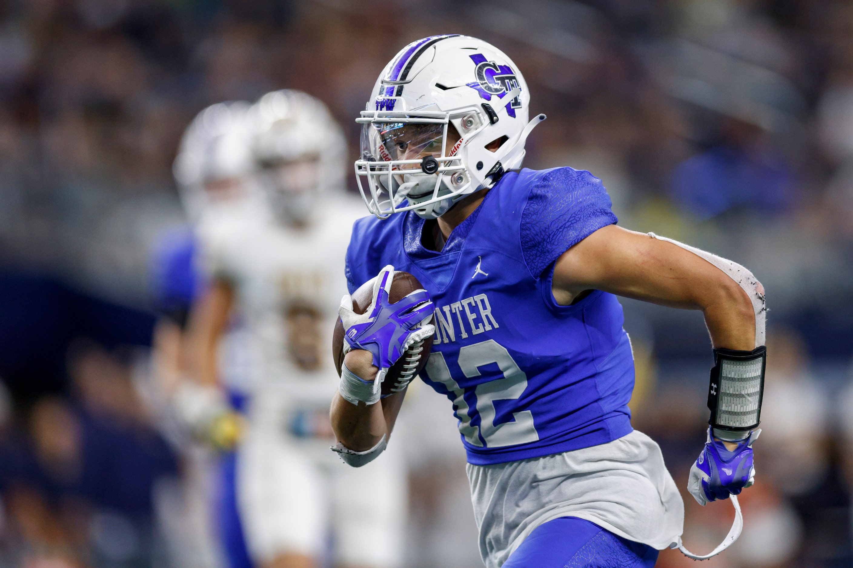 Gunter running back Ivy Hellman (12) runs for a touchdown during the second half of the...