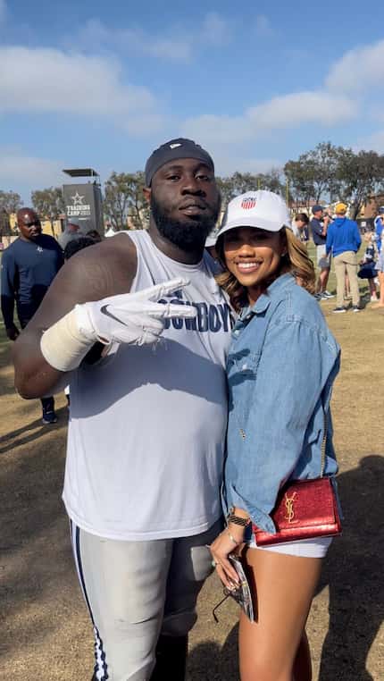Neville Gallimore poses for a photo with Chelsie after a training camp practice in 2021....
