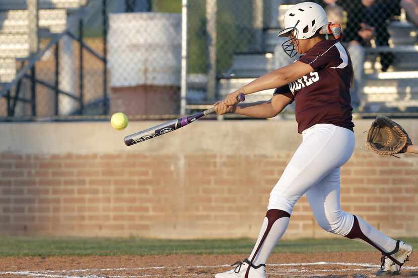 Mansfield Timberview sophomore Mariah Denson (22) makes contact for a double during a high...