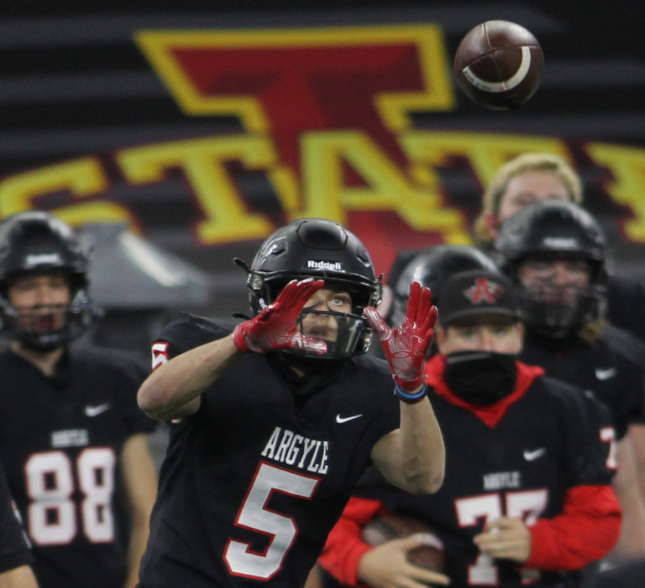 Argyle receiver Cole Kirkpatrick (5) shows great focus as he eyes a CJ Rogers pass in for a...