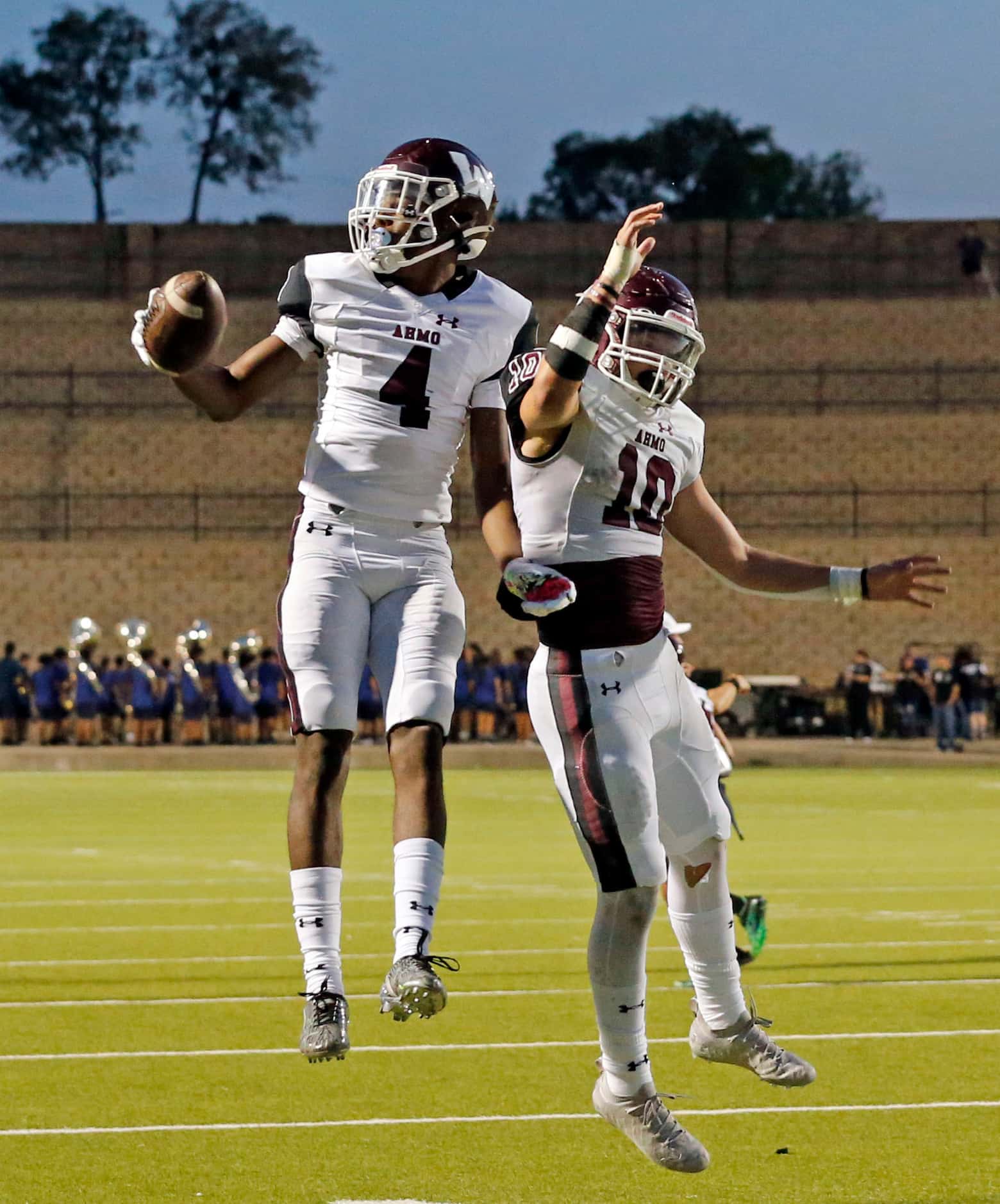 Wylie High WR Chris Lewis (4) celebrates with RB Layne Chapman (10), after making a...
