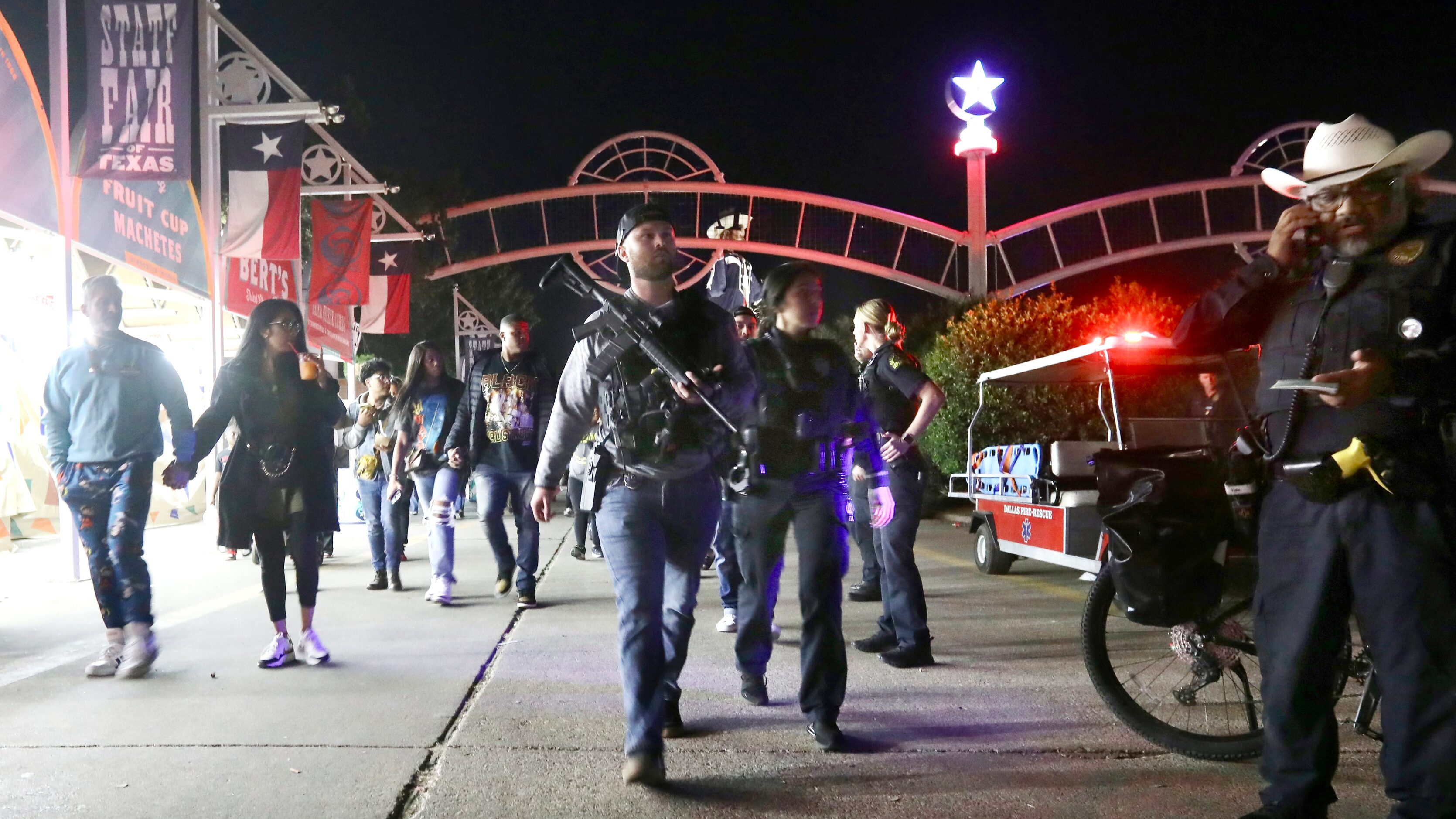 Dallas Police officers work near the scene of a shooting at the State Fair of Texas on...