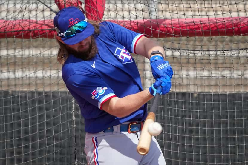 Infielder Davis Wendzel takes batting practice during a Texas Rangers minor league spring...