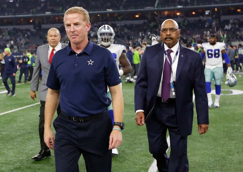 Dallas Cowboys head coach Jason Garrett exits the field after losing to the Seattle Seahawks...