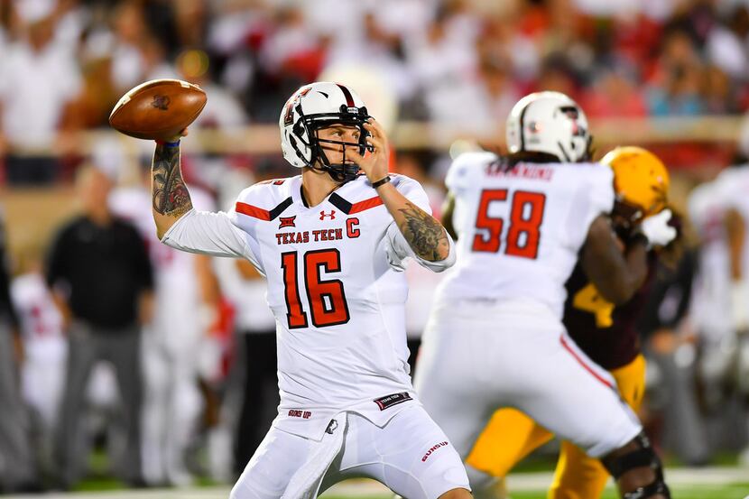 LUBBOCK, TX - SEPTEMBER 16: Nic Shimonek #16 of the Texas Tech Red Raiders looks to pass the...