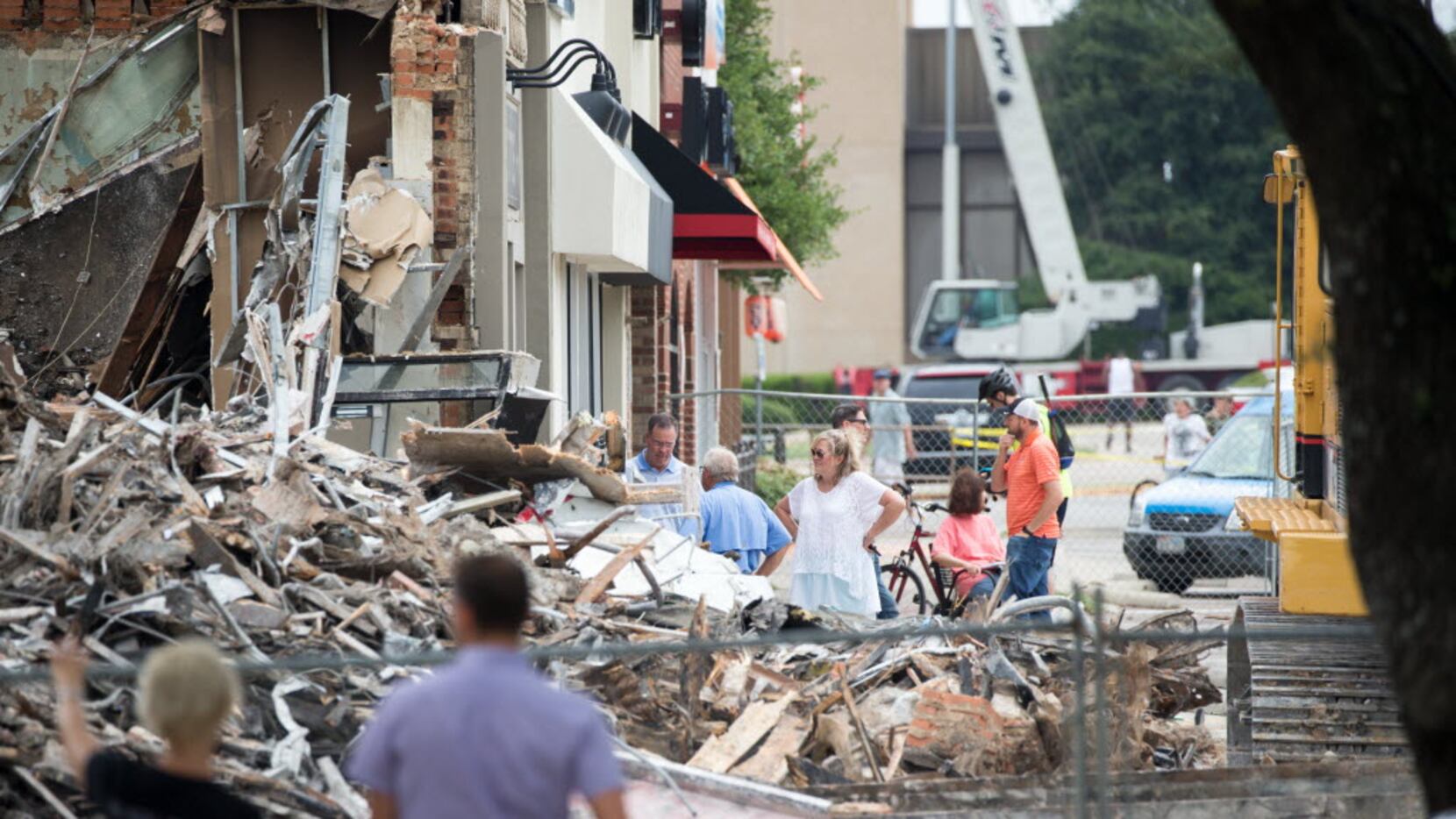 The owners of Goff's Hamburgers surveyed the remains after the restaurant was demolished...