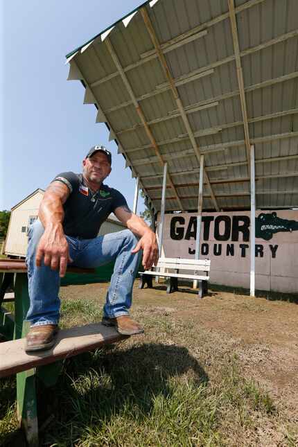 Gary Saurage, co-owner of Gator Country, provides a home for reptiles and rehabilitates...