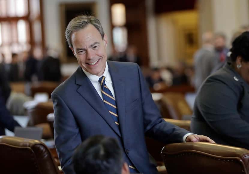 Texas Speaker of the House Joe Straus, R-San Antonio, talks with fellow lawmakers on the...