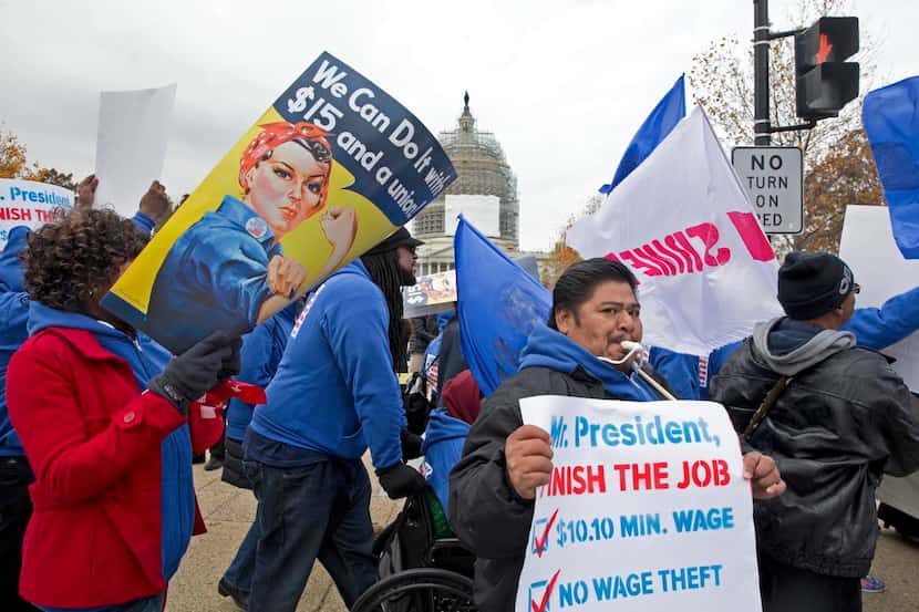 
Protesters called for an increase in the minimum wage outside the Capitol in Washington in...