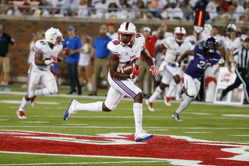 Southern Methodist wide receiver Brandon Benson (10) scores on reception and long TD run...