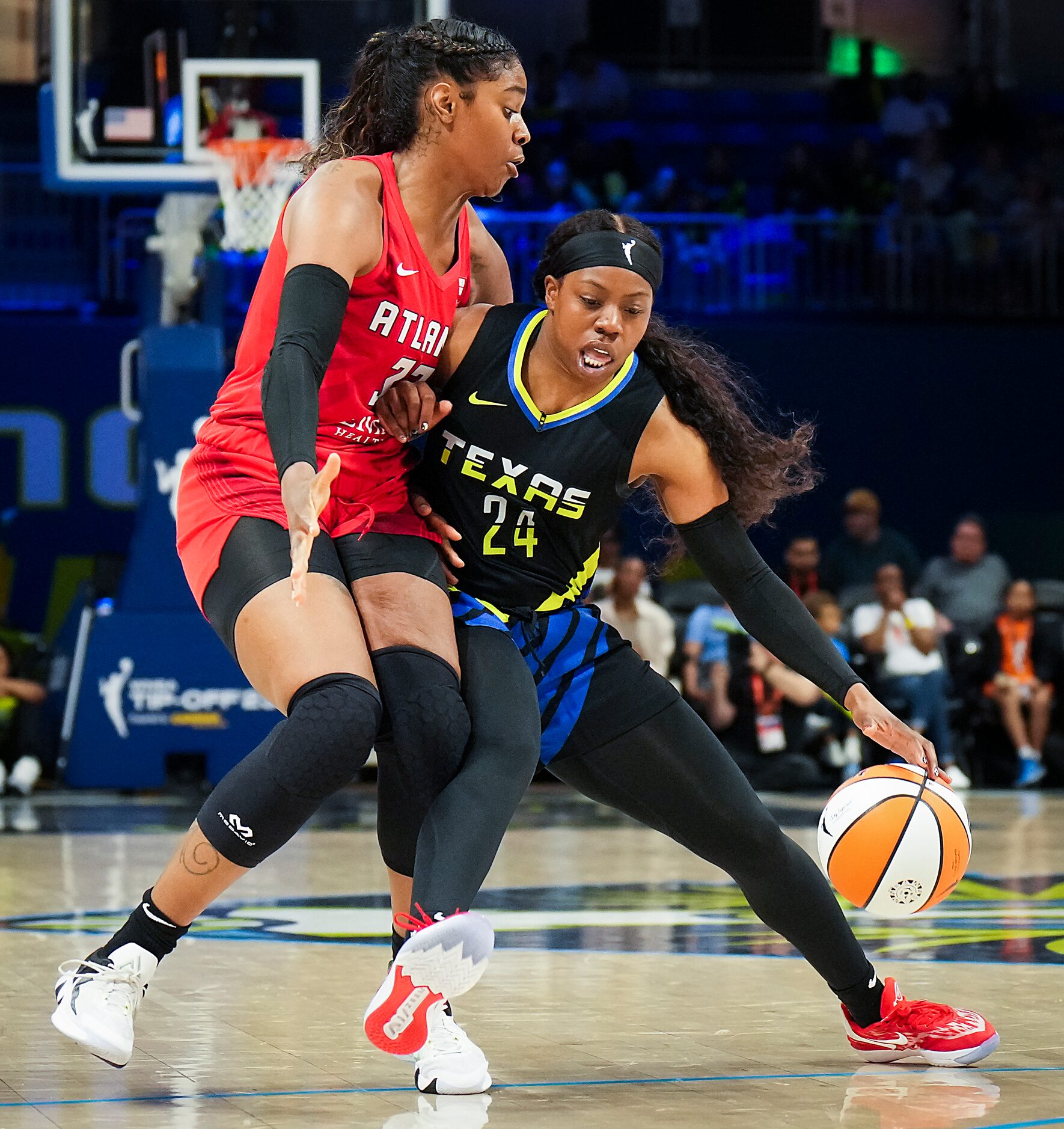 Dallas Wings guard Arike Ogunbowale (24) drives against Atlanta Dream forward Cheyenne...