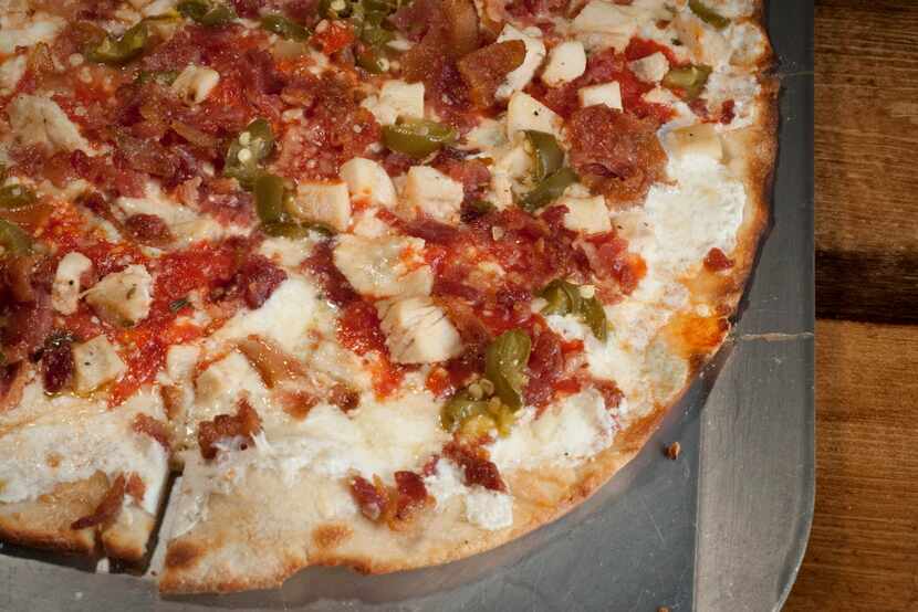 "The Dream" pizza, with house mozzarella, gorgonzola, tomato sauce, chicken, pancetta and...