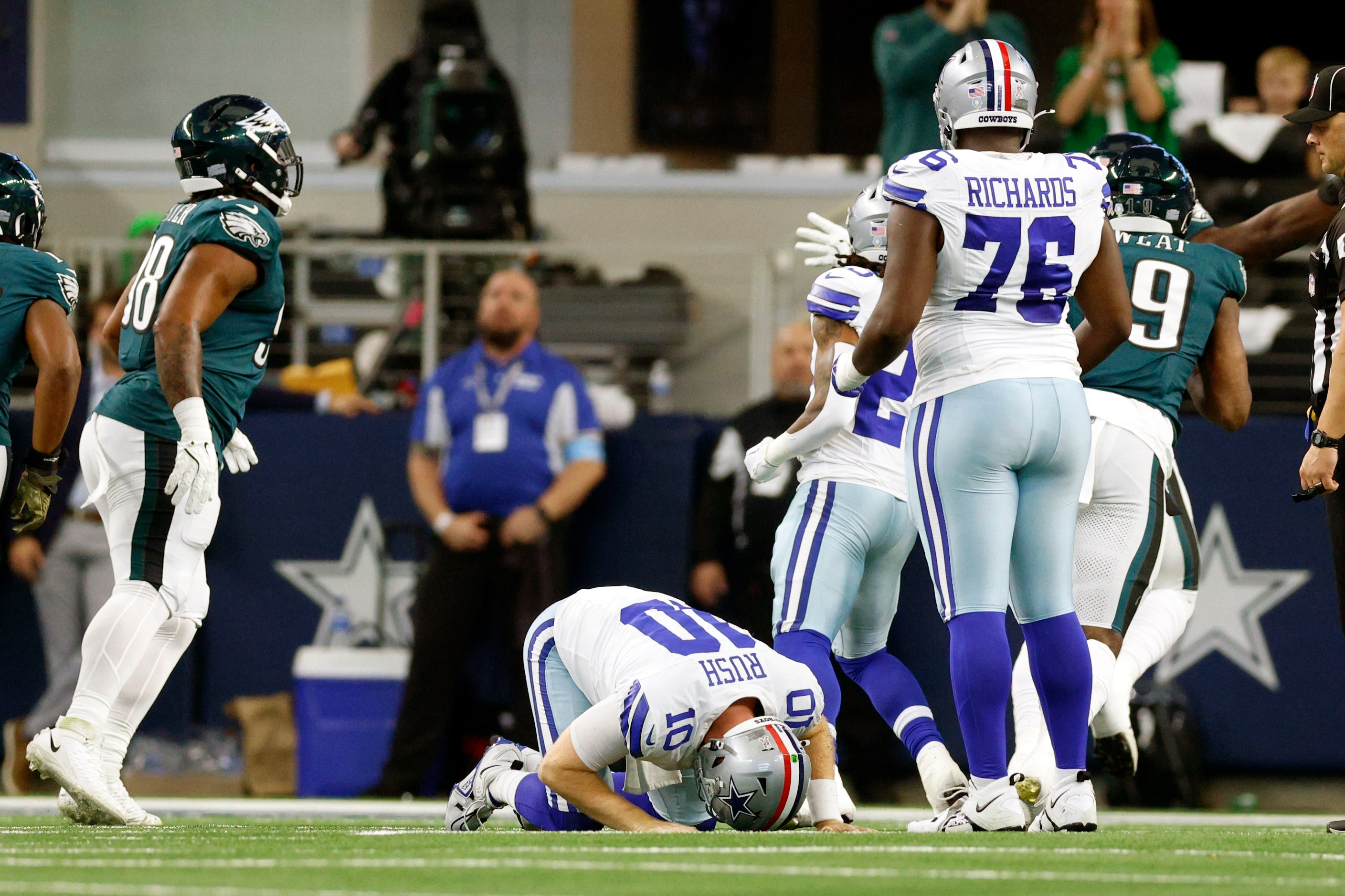 Dallas Cowboys quarterback Cooper Rush (10) is slow to get up after a sack and fumble during...