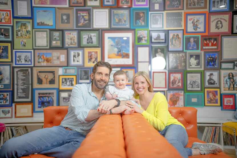 Rogers Healy, his daughter Henley, and wife Abby in his Hotel California showroom where he's...