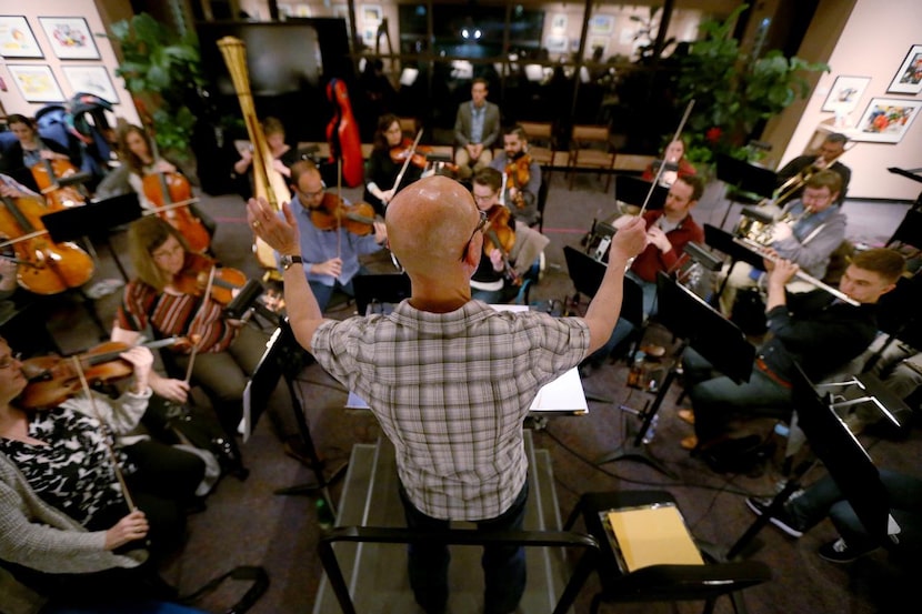 
Conductor Jay Dias practices during a rehearsal of The New Moon, presented by Lyric Stage...