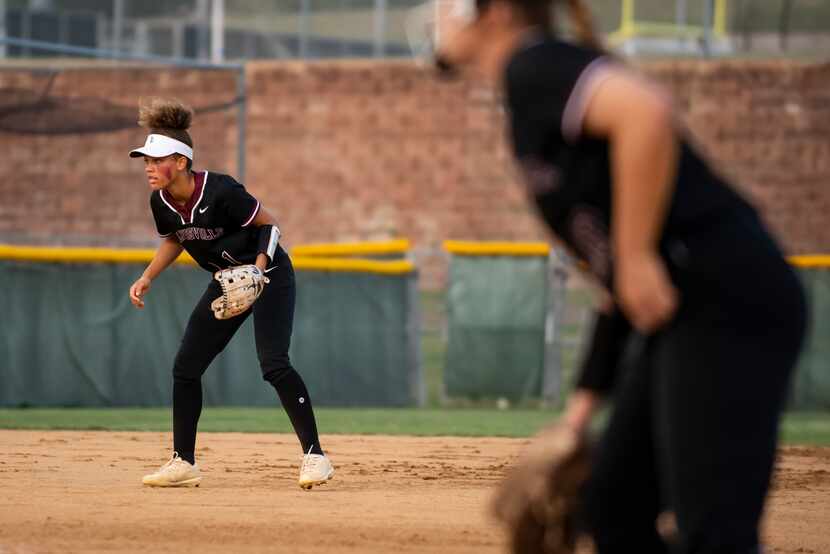 Lewisville shortstop Paislie Allen (1) gets in position to make a play during the District...