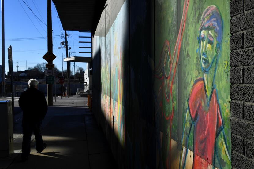 Murals in the Warehouse District allude to the neighborhood's new stature as a center for...