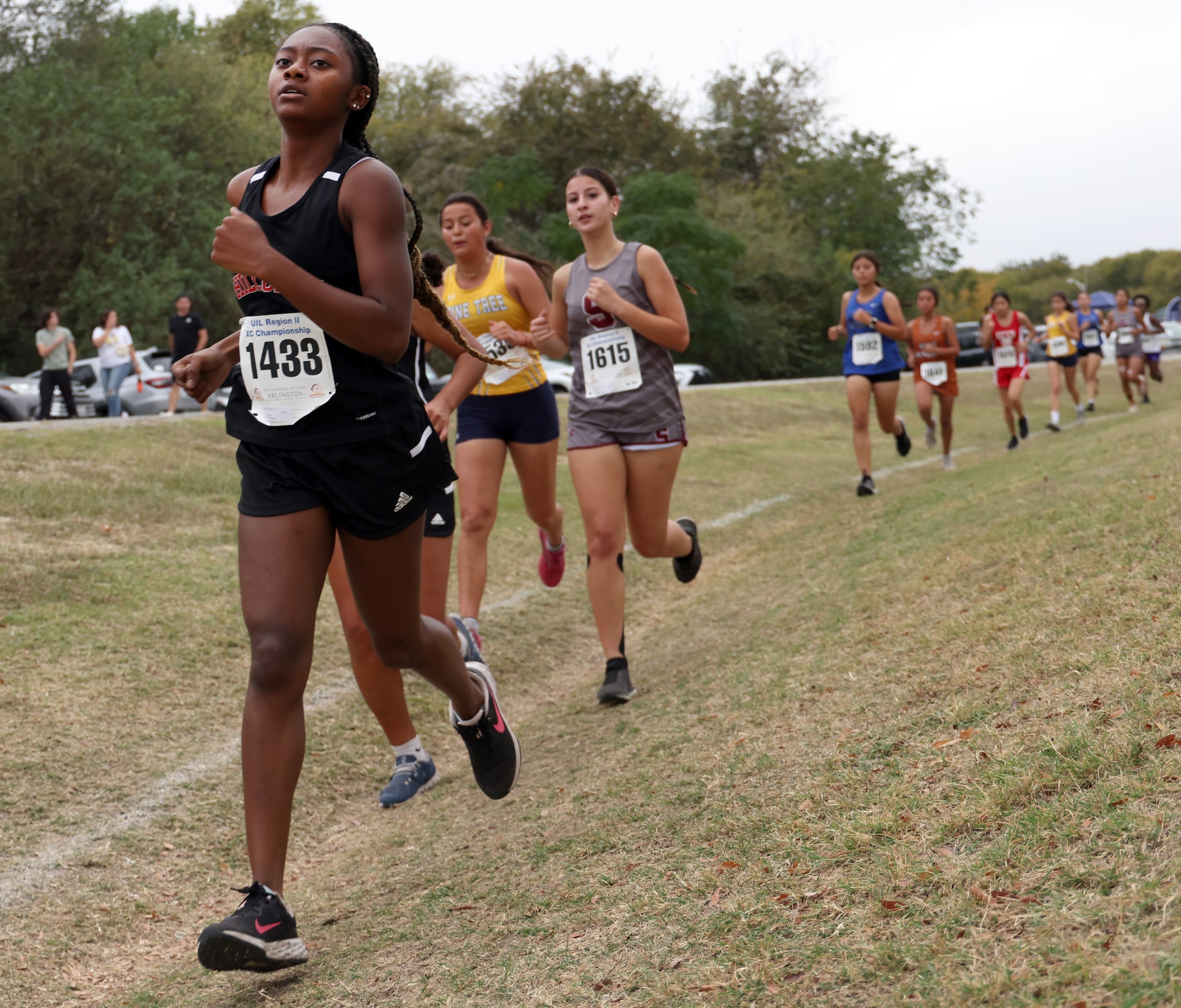 Runners compete in the Girls Class 5A Region 2 race. The Class 5A Region 2 boys and girls...