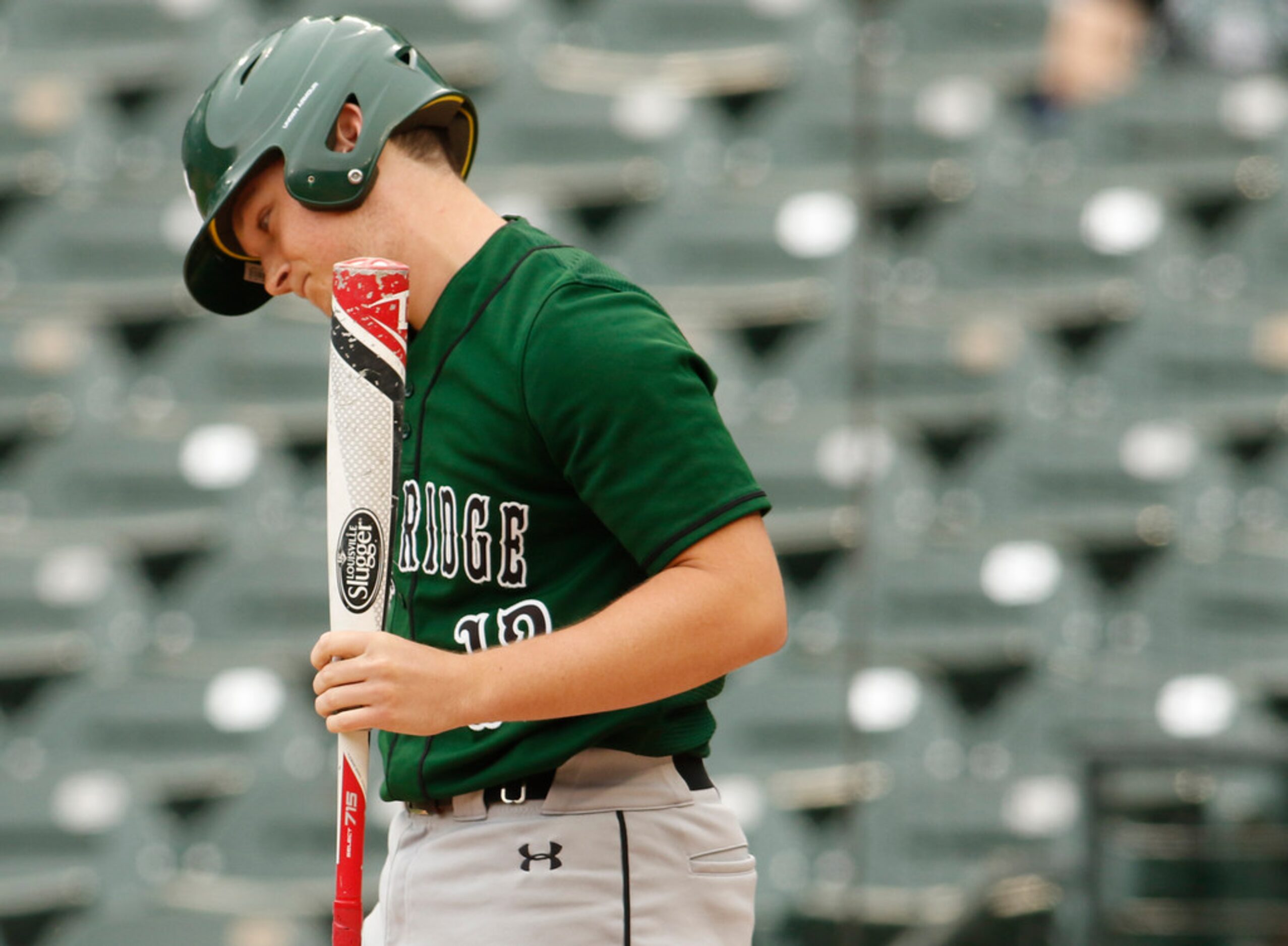 Mansfield Lake Ridge designated hitter Reece Gray (12) reacts after a called third strike...