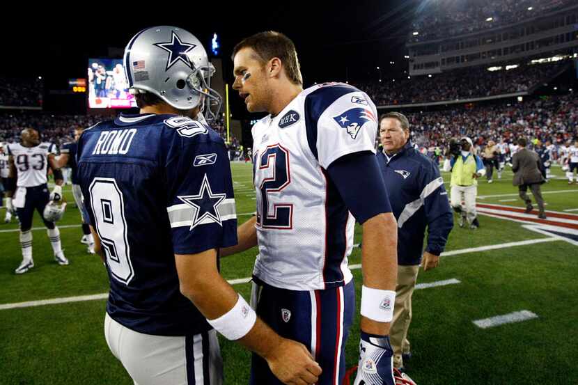 Dallas Cowboys quarterback Tony Romo (9) and New England Patriots quarterback Tom Brady (12)...