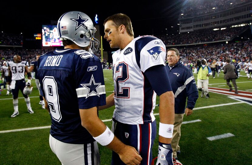 Dallas Cowboys quarterback Tony Romo (9) and New England Patriots quarterback Tom Brady (12)...