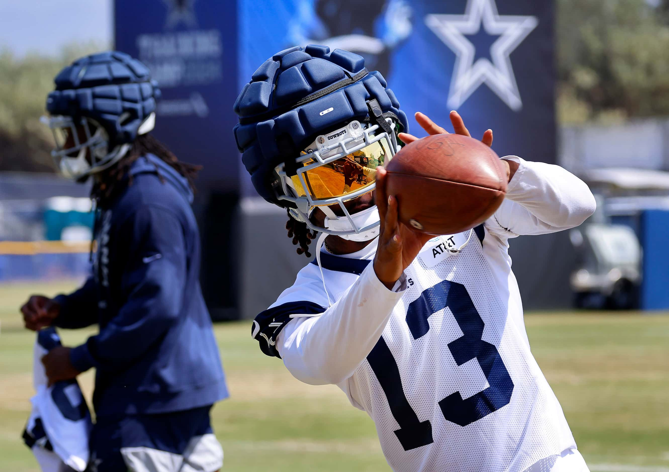 Dallas Cowboys wide receiver Tyron Billy-Johnson (13) catches passes off the throwing...