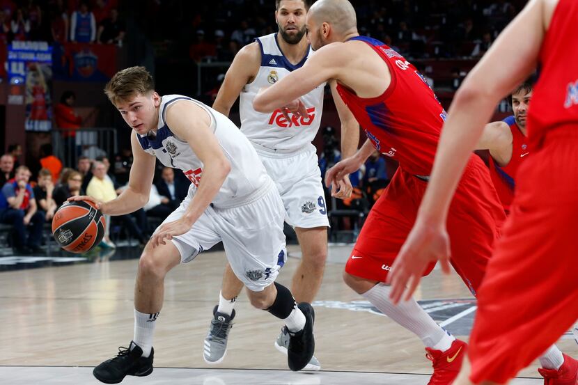 FILE - CSKA Moscow's James Augustine (right) defends Real Madrid's Luka Doncic during their...