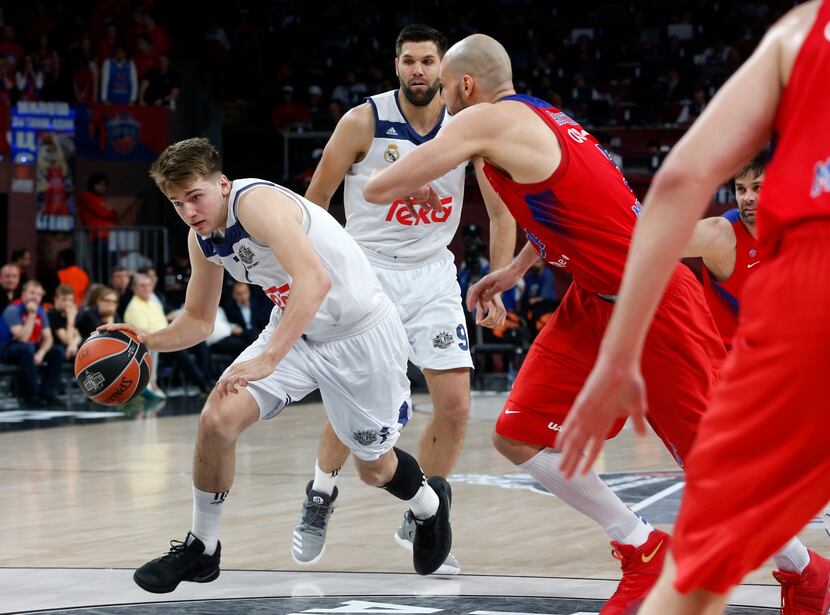 FILE - CSKA Moscow's James Augustine (right) defends Real Madrid's Luka Doncic during their...