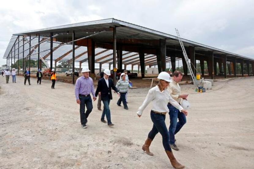 
Council members and staff tour the Texas Horse Park, the city-funded center scheduled to...