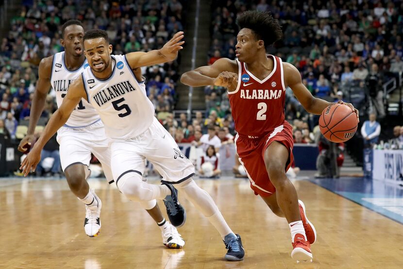 PITTSBURGH, PA - MARCH 17:  Collin Sexton #2 of the Alabama Crimson Tide dribbles against...