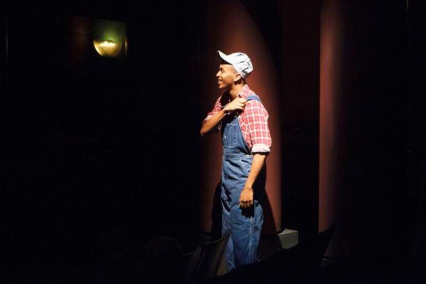 

 
Gabriel Lawson, playing the trainman, sings from a side position during The Human Comedy...