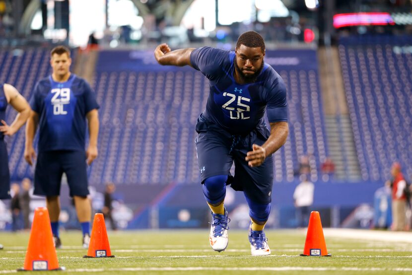 Florida offensive lineman Chaz Green runs a drill at the NFL football scouting combine in...