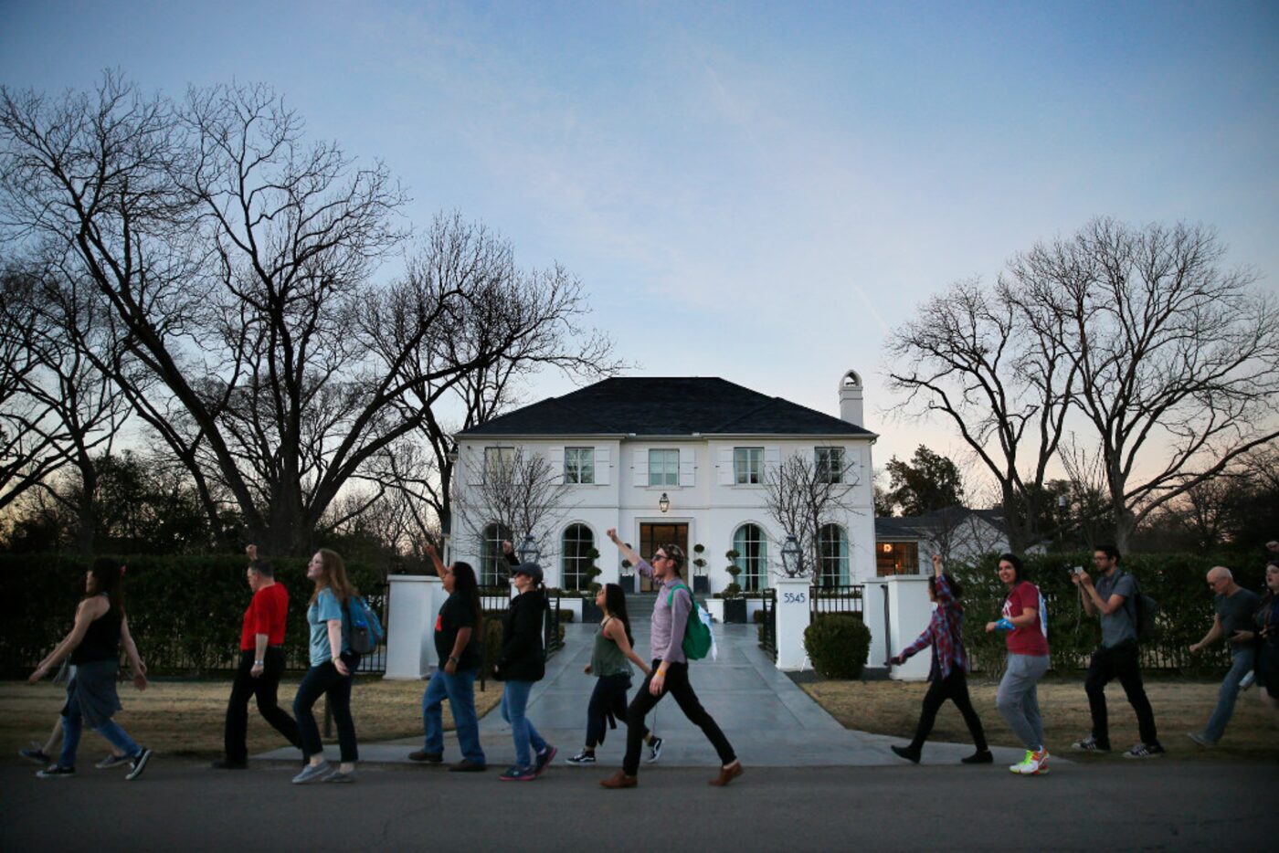 Protesters marched to Energy Transfer Partners CEO Kelcy Warren's Dallas home (not pictured)...