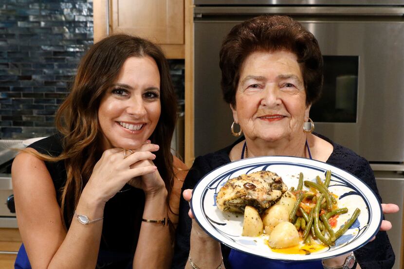 Christina Moros and her grandmother Christina Zarras show off their Greek Chicken and...