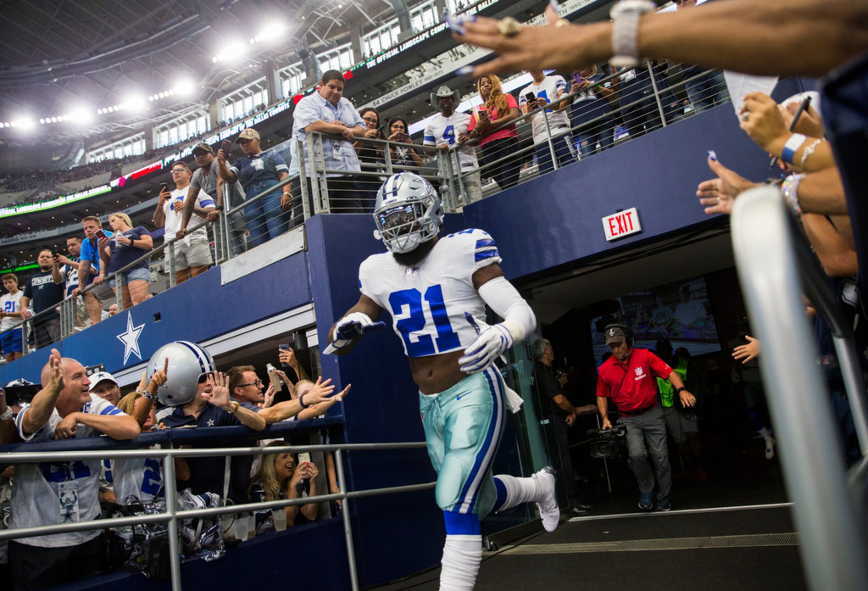 Dallas Cowboys running back Ezekiel Elliott (21) enters the field for warm ups before an NFL...