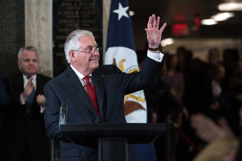 Outgoing Secretary of State Rex Tillerson waved as he bid farewell to State Department staff...