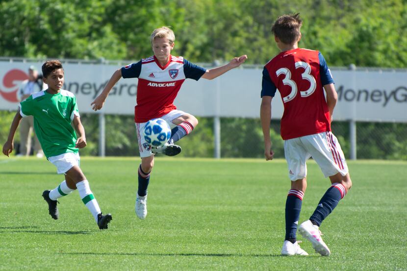 Nolan Norris traps the ball against Ikapa United in the 2019 Dallas Cup Super 14s while...