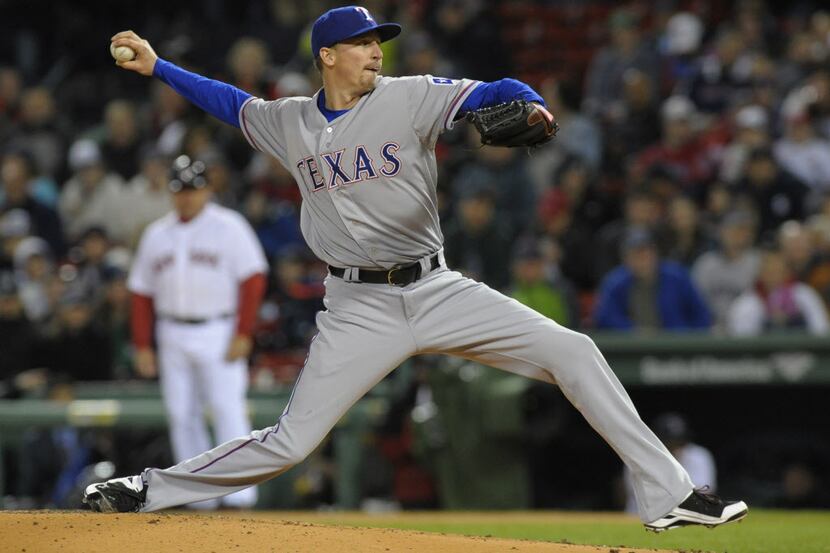 Apr 7, 2014; Boston, MA, USA; Texas Rangers starting pitcher Tanner Scheppers (52) pitches...