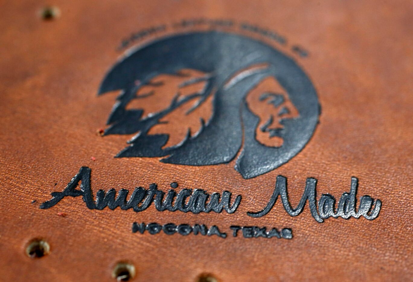 Detail of the American Made mark made on a piece of leather that will soon become part of a...