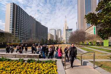 The Dallas Morning News architecture critic Mark Lamster leads a walking tour with...