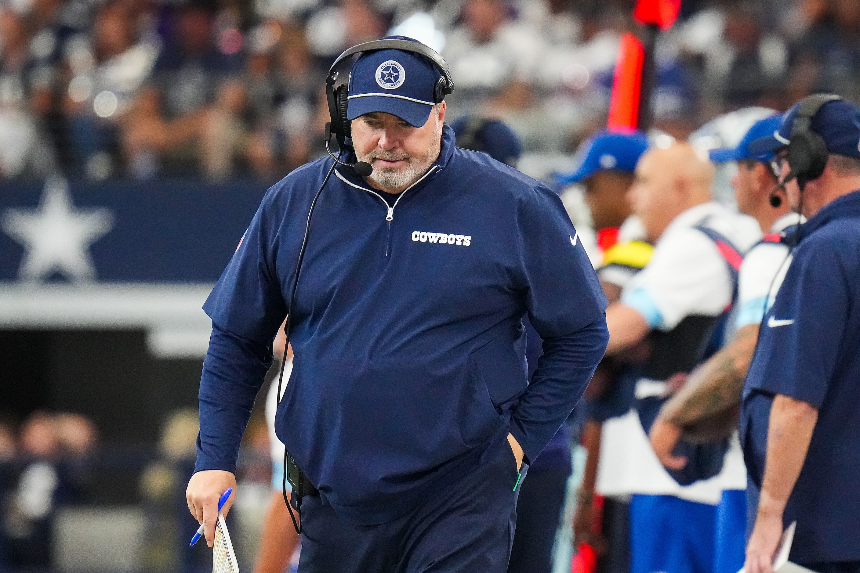 Dallas Cowboys head coach Mike McCarthy works on the sidelines during the first half an NFL...