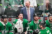 Dallas Stars head coach Pete DeBoer watches from the bench during the third period in Game 5...