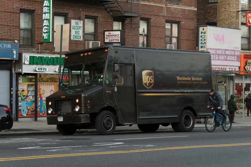 A UPS truck makes deliveries in Manhattan, Dec. 7, 2017. During the holiday season, the...