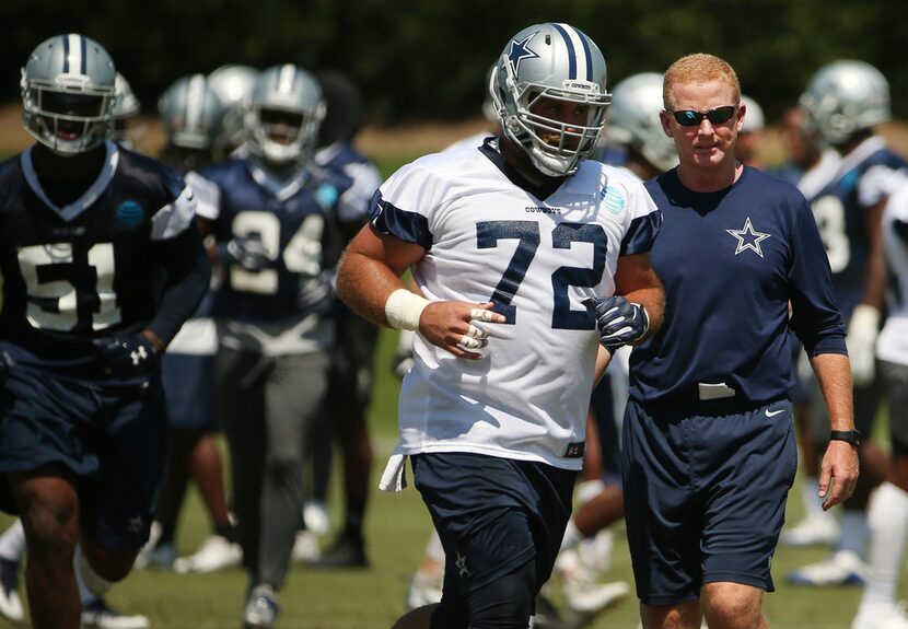 Dallas Cowboys center Travis Frederick and head coach Jason Garrett during a mandatory...